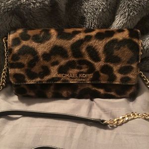Michael kors cowhide leather crossbody/ wallet.
